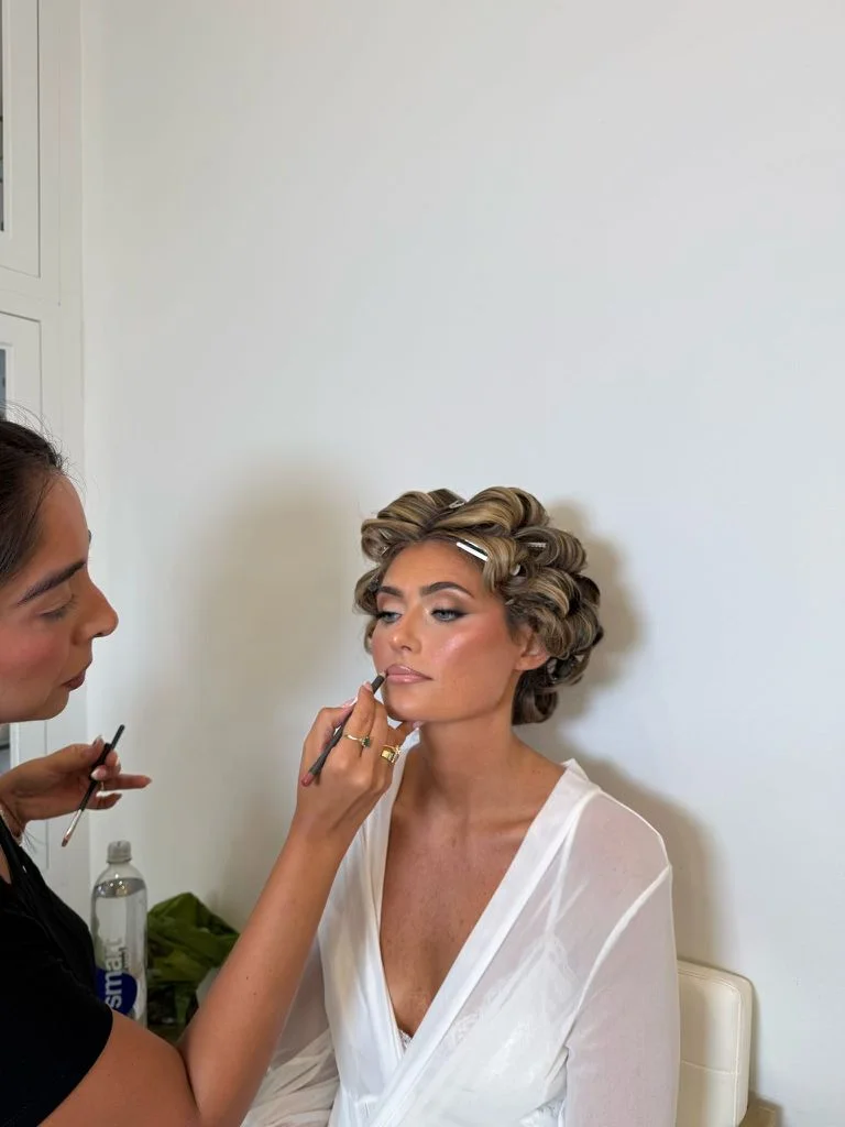 Professional bridal makeup artist Daniella G creating stunning look for New Jersey wedding